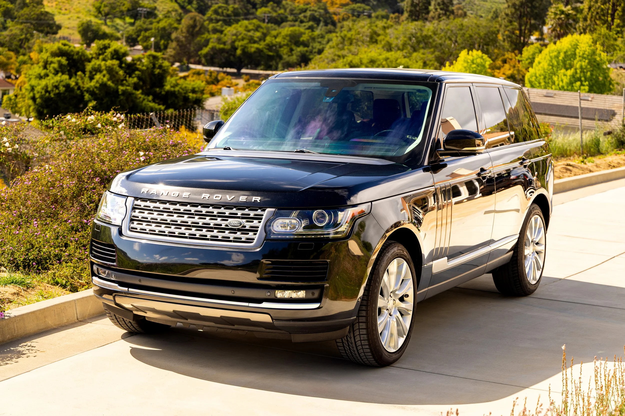 2014 Range Rover Supercharged in dark studio lighting